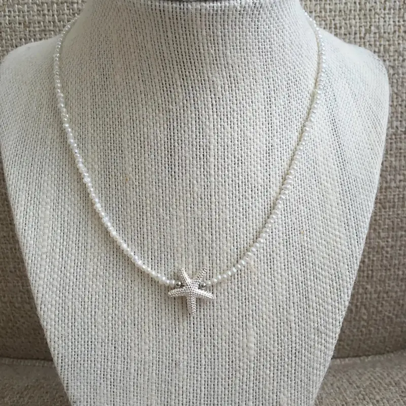 Starfish Pendant Necklace Featuring A Cultured Pearl Accent 1